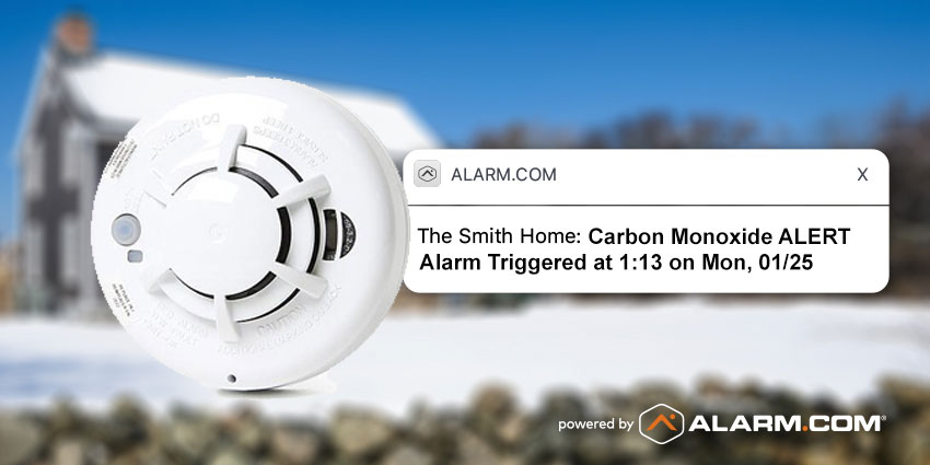 Carbon Monoxide alert from Alarm.com with close up of carbon monoxide detector Carbon Monoxide alert from Alarm.com with close up of carbon monoxide detector