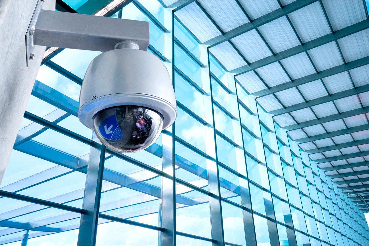 Commercial Security Camera in big window skyscraper Commercial Security Camera in big window skyscraper