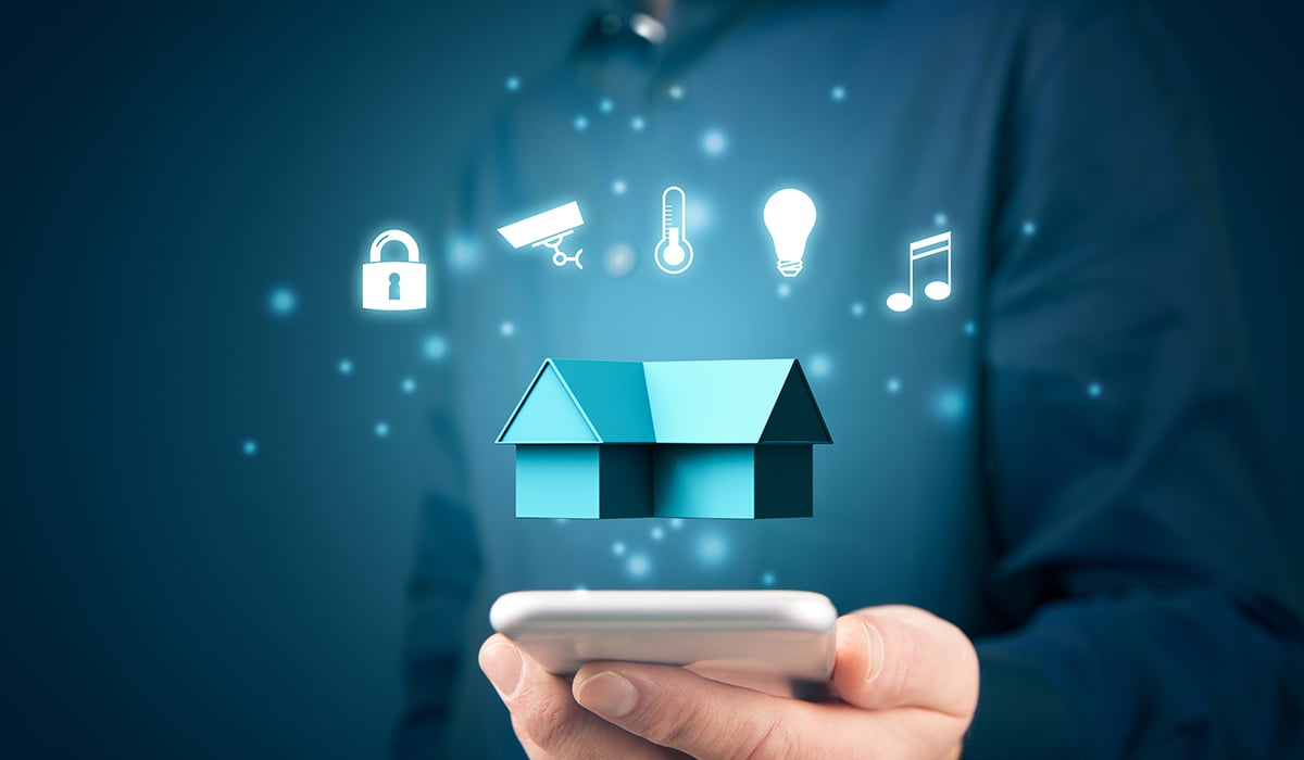 Tech like illustration of house floating above cell phone with smart icons - lock, camera, temperature, light and music note Tech like illustration of house floating above cell phone with smart icons - lock, camera, temperature, light and music note